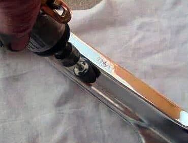 Hand detail polishing of a trim piece